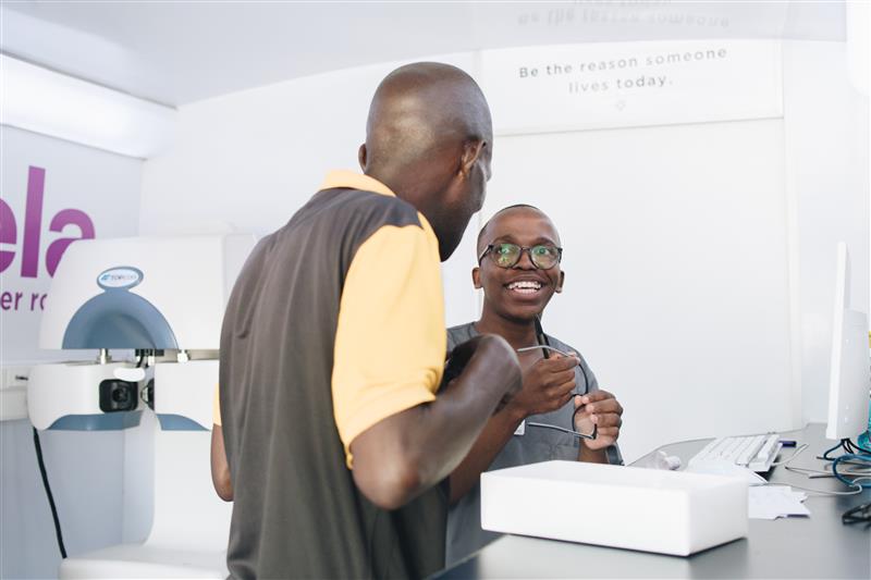 Nurse performing an eye test on a patient